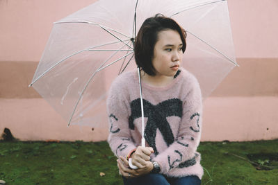 Young woman with umbrella