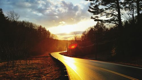 View of road against cloudy sky