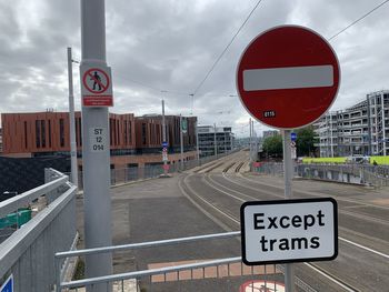 Road signs against sky