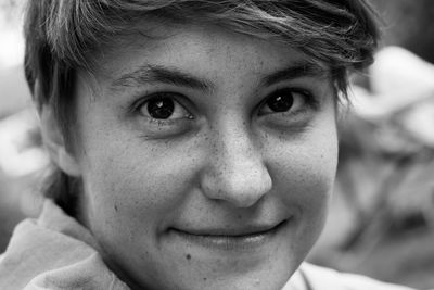 Close-up portrait of a smiling mid adult man