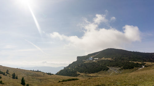 Panoramic shot of countryside landscape against sky