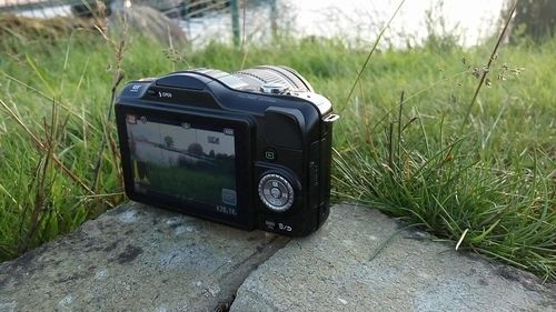 Close-up of camera on grass