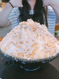 Woman holding ice cream cone