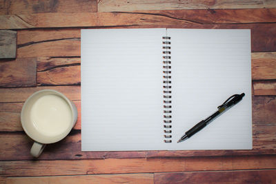 High angle view of open book on table