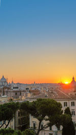 High angle view of cityscape against sky during sunset