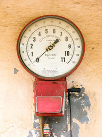 Close-up of clock on wall