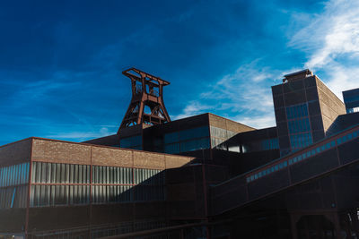 Low angle view of modern building against sky