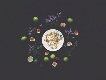 High angle view of drink on table against black background