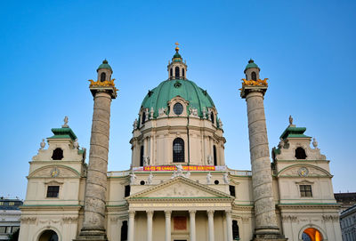 Low angle view of building against blue sky