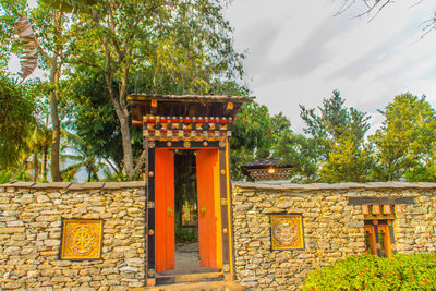 Entrance of temple against building