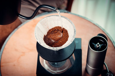 High angle view of coffee cup on table