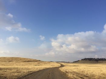 Scenic view of desert against sky