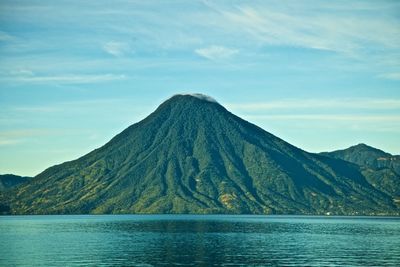 Scenic view of volcanic mountain against sky