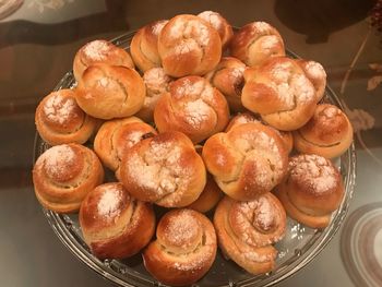 High angle view of cupcakes in plate on table