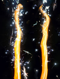 Close-up of fire crackers at night