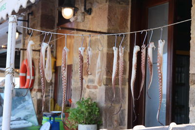 Clothes hanging in store for sale in market