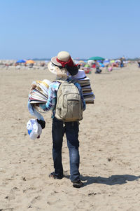 Rear view of man on beach