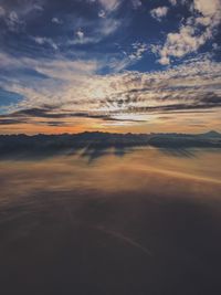 Scenic view of dramatic sky during sunset