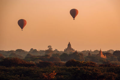 View of hot air balloon in sky at sunset