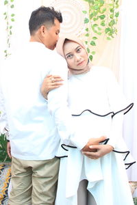 High angle view of doctor examining patient at clinic