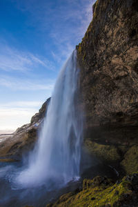 View of waterfall against sky
