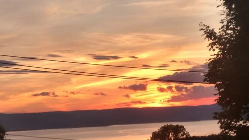 Scenic view of dramatic sky during sunset