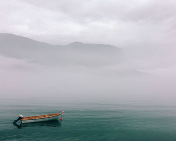 Boats sailing in sea