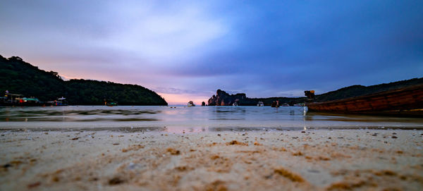 Scenic view of beach against sky during sunset