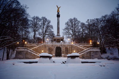 Monument and fountain with column and angel