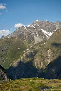 Scenic view of snowcapped mountains against sky