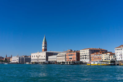 Venice cityscape as seen from the water, with san marco district in view. 