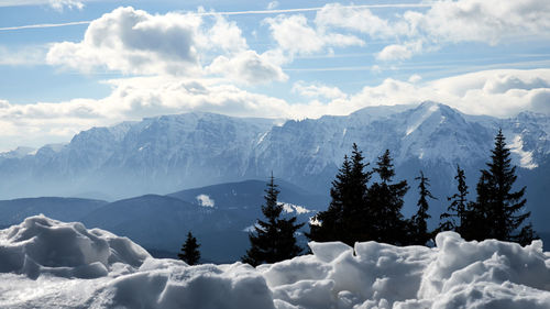 Scenic view of snowcapped mountains against sky