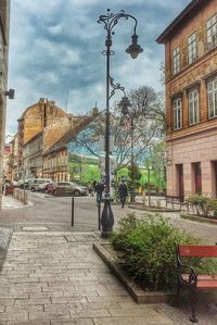 Buildings in city against sky