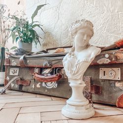 Statue on table at home