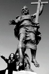 Low angle view of man against sky