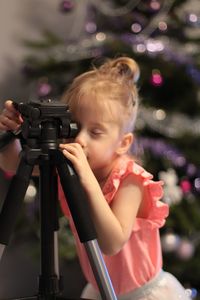 Portrait of girl photographing