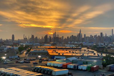 High angle view of buildings against sky during sunset
