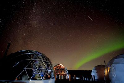Domes against star field in sky at night