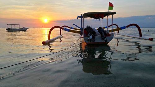 Scenic view of sea at sunset