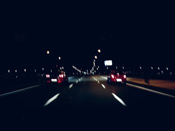 Traffic on road at night