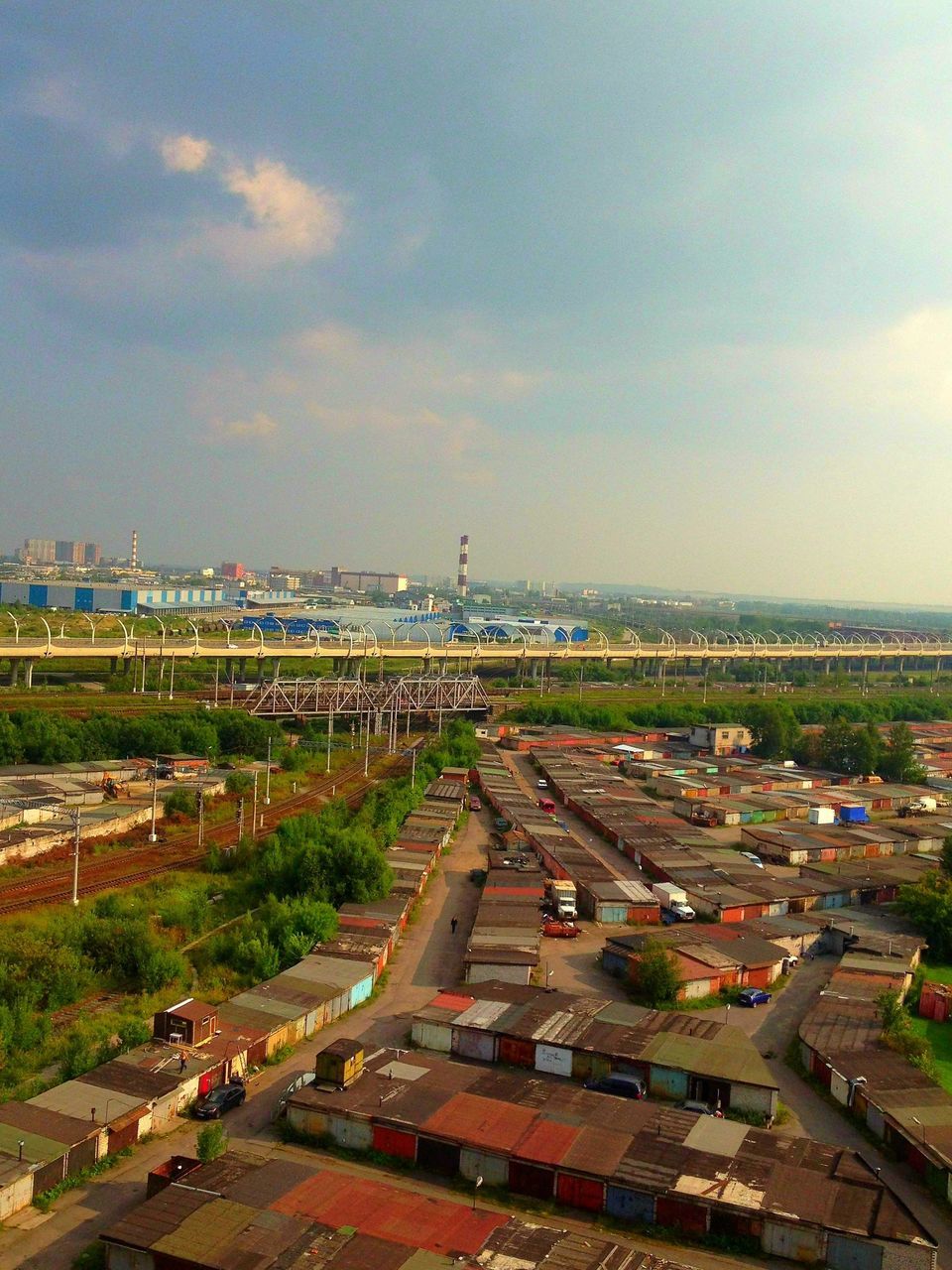 HIGH ANGLE VIEW OF CITY AT SEASIDE