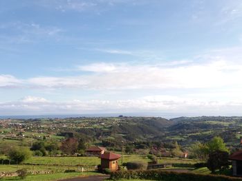 Scenic view of field against sky