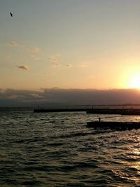 Scenic view of sea at sunset