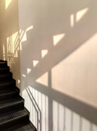 Shadow of staircase on wall