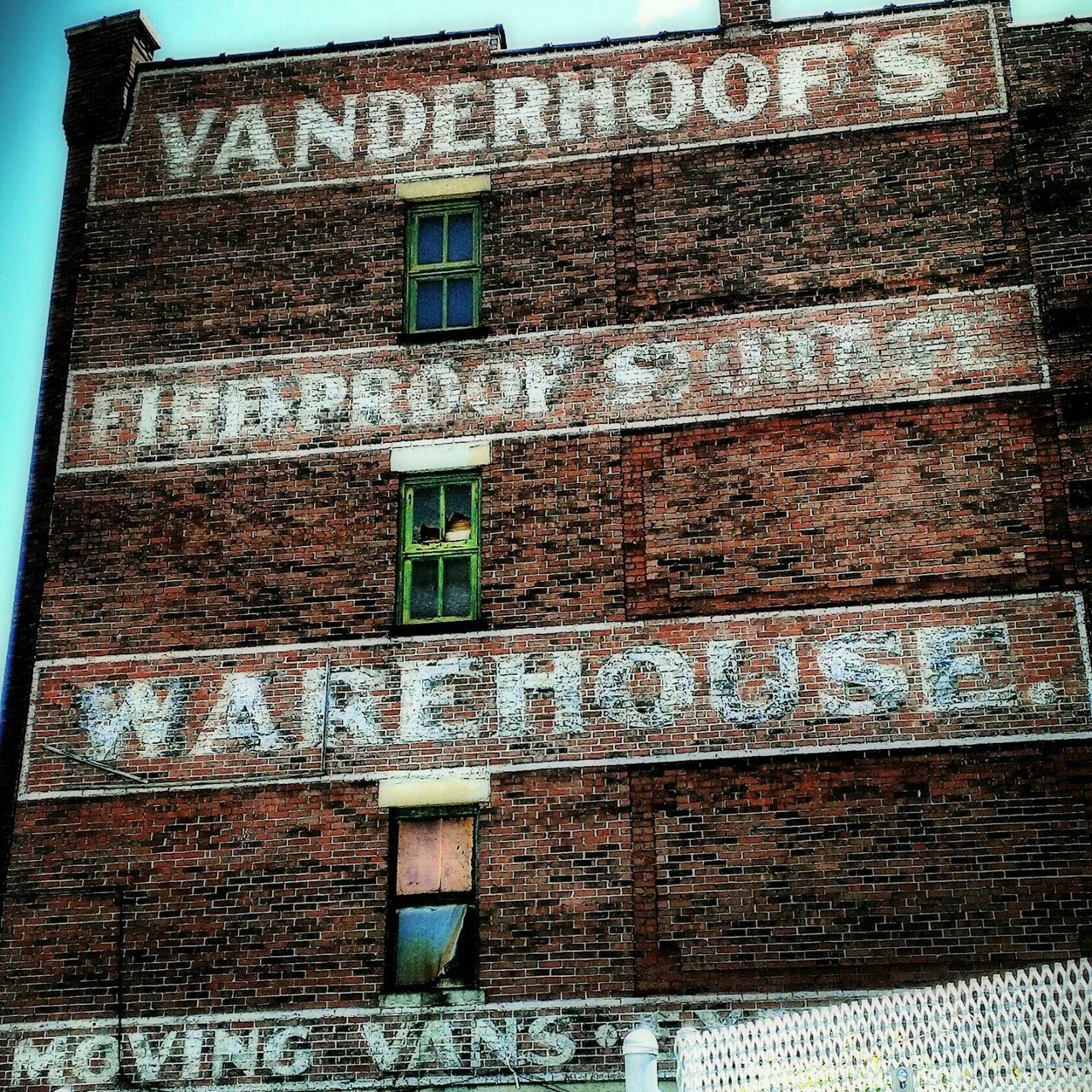 architecture, built structure, building exterior, low angle view, window, brick wall, wall - building feature, building, brick, day, stone wall, wall, old, no people, outdoors, sky, pattern, history, sunlight, facade