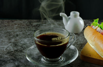 Close-up of coffee cup on table