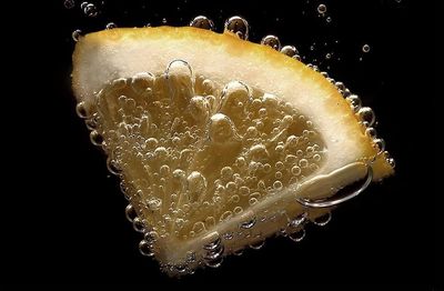 Close-up of water over black background