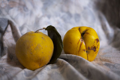 Close-up of oranges on table