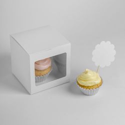 Close-up of cupcakes against white background
