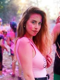 Portrait of young woman with a colorful background. 